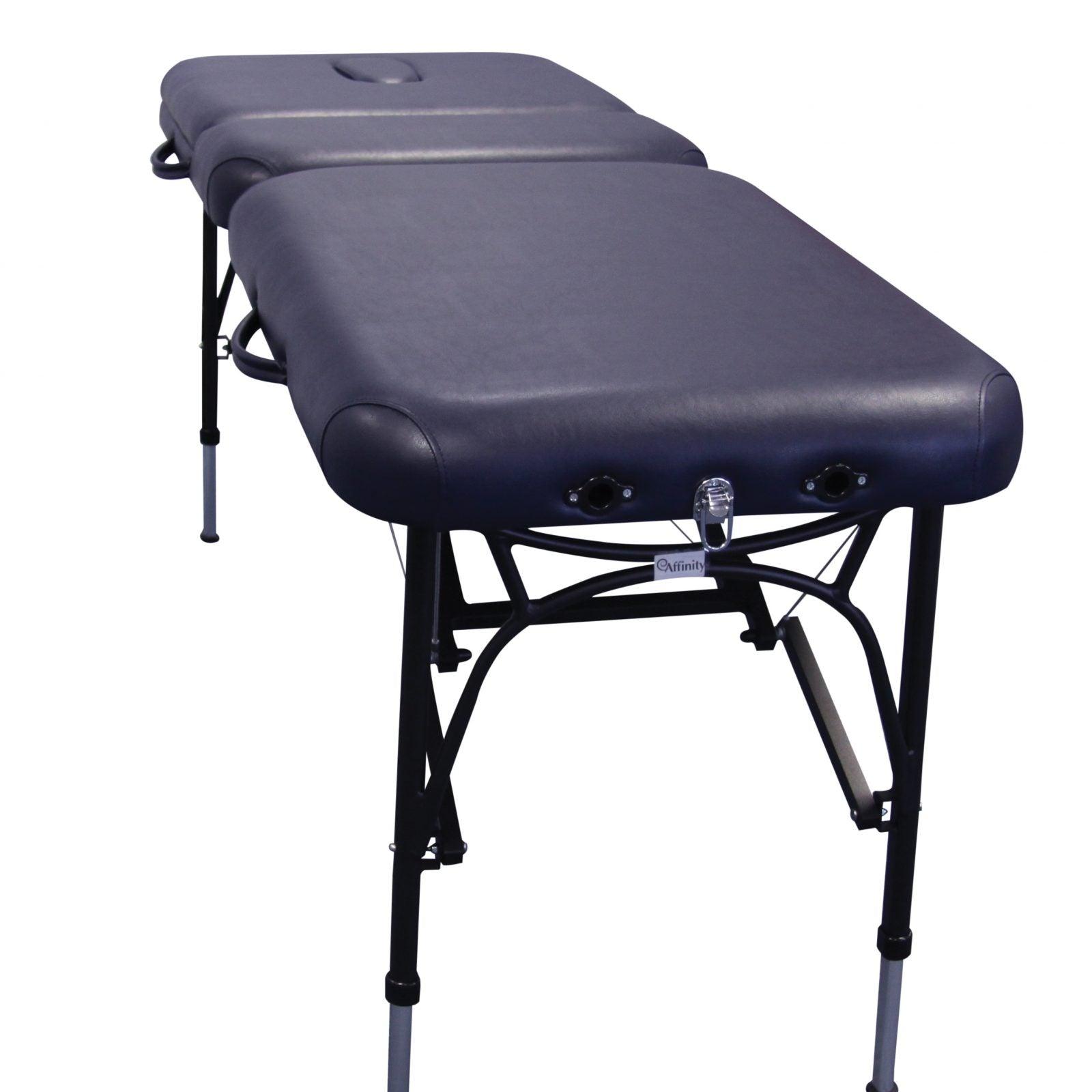 Portable Affinity Marlin Massage couch. Navy blue colour